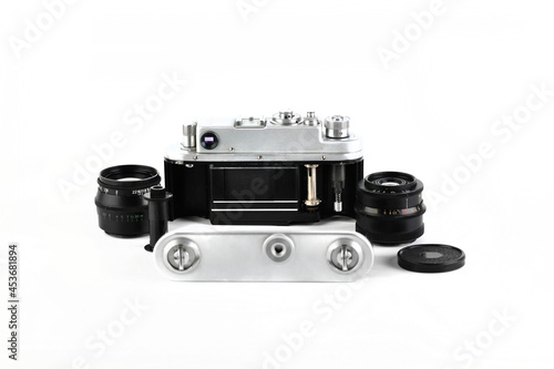 Old rangefinder film photo camera on white background. photo