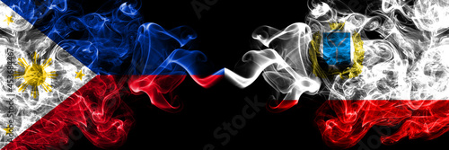Philippines, Filipino vs Russia, Russian Saratov Oblast smoke flags side by side.