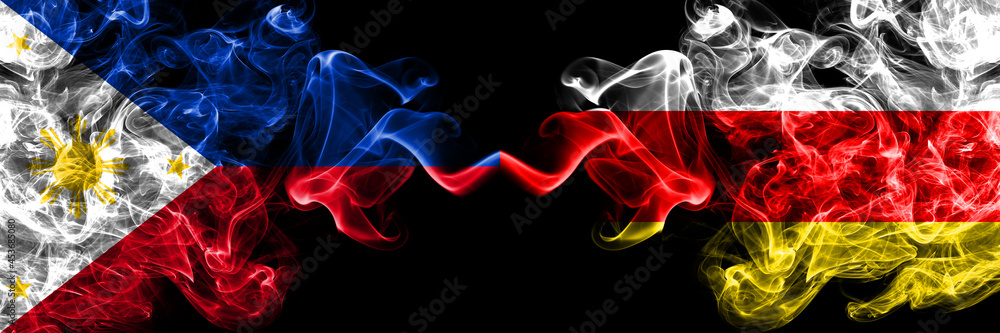 Philippines, Filipino vs South Ossetia smoke flags side by side. Philippines, Filipino vs South Ossetia smoke flags side by side.