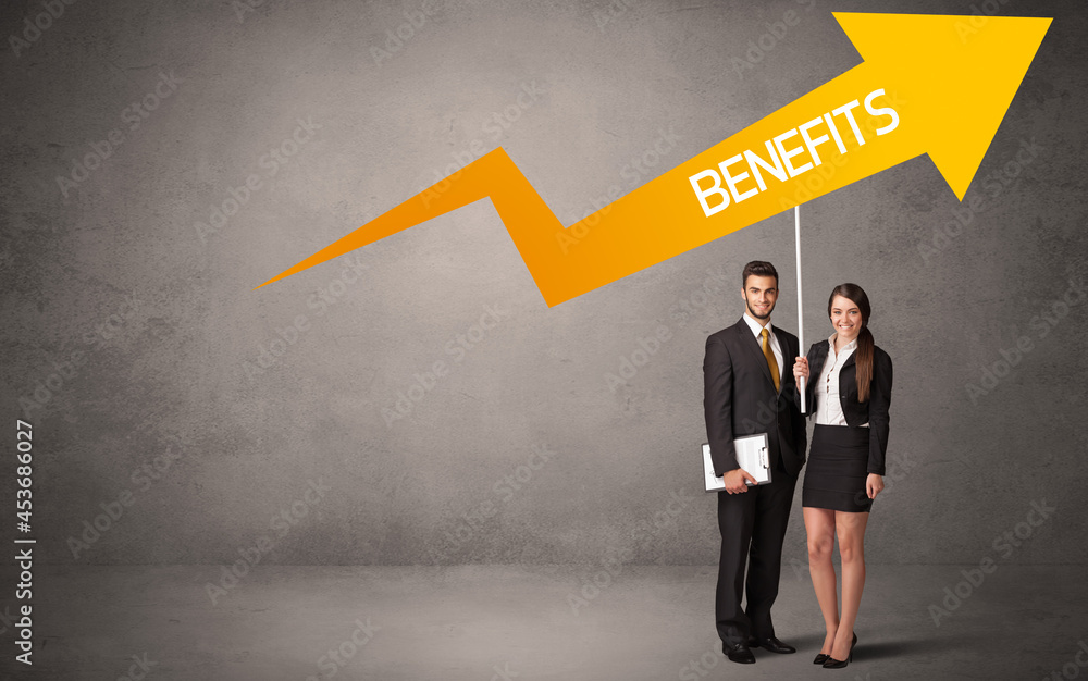 Fototapeta premium Young business person in casual holding road sign