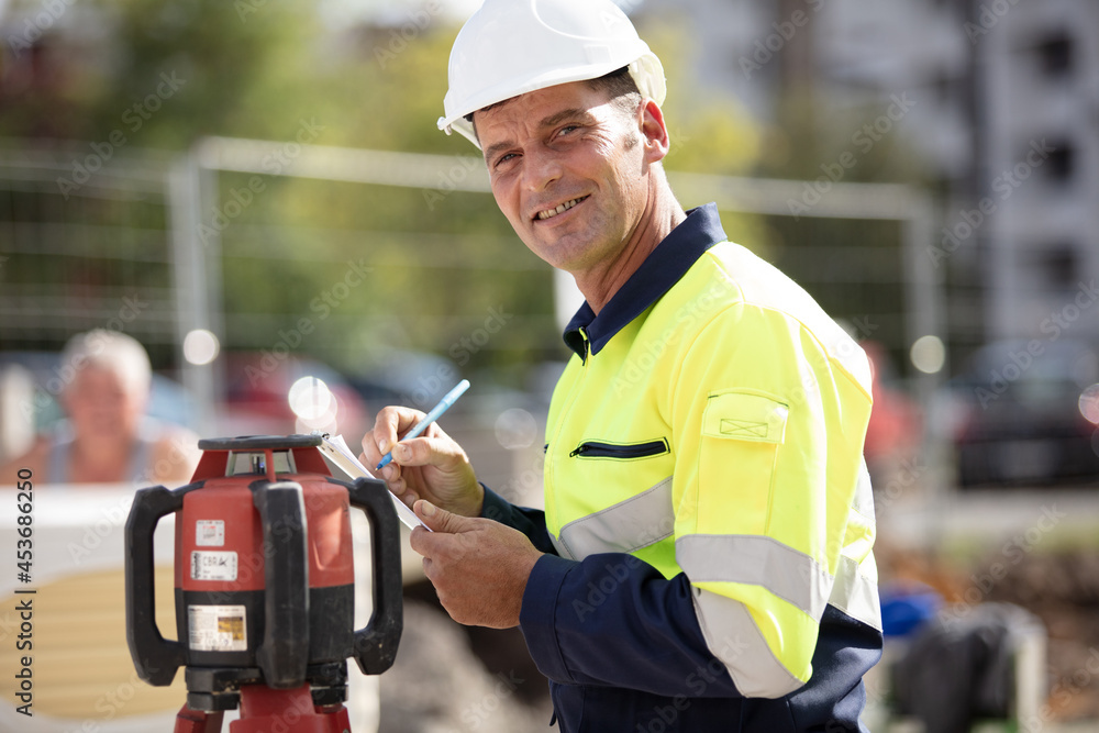 handsome construction worker laying foundations handsome construction worker laying foundations