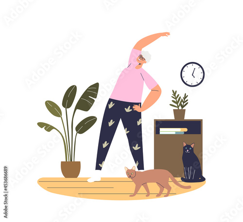Senior lady doing exercises training at home. Active elder female workout in living room