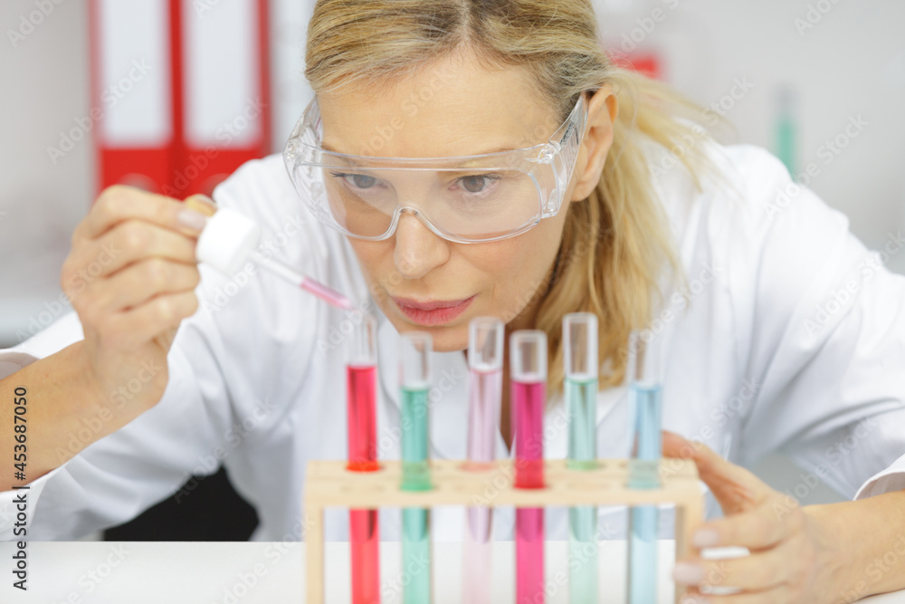 a mature lab scientist at work a mature lab scientist at work