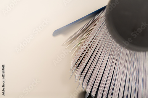 Side view of Rolodex device for contact details