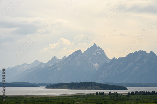 Photography Stormy weather and wildfire smoke over Jackson Lake, Grand Teton National Park,
