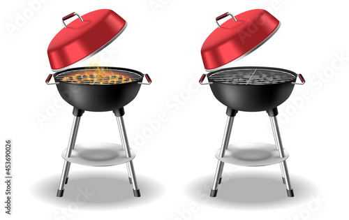 Round barbecue, BBQ charcoal grill empty and with burning flame, fire and hot coals