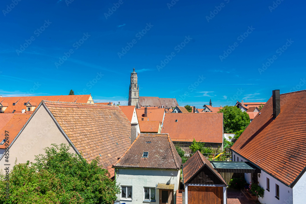 View of the houses of the historic center of Nordlingen from the city walls in Germany View of the houses of the historic center of Nordlingen from the city walls in Germany