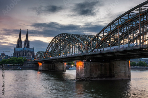 COLOGNE, GERMANY, 23 JULY 2020 Colorful sunset over Cologne Cathedral and Hohenzollern Bridge © Stefano Zaccaria