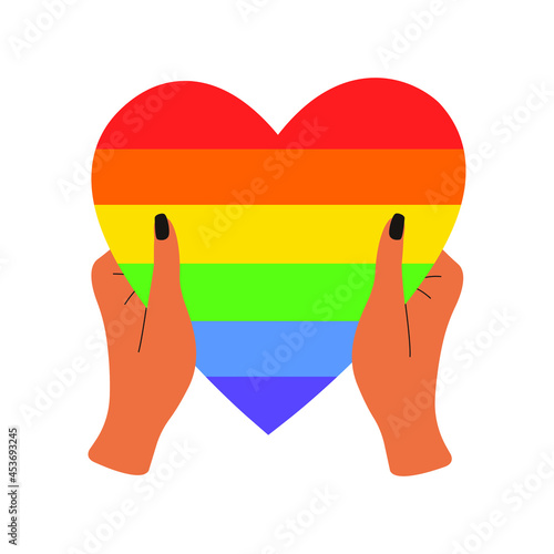 Vector illustration of a rainbow heart in the palms, a symbol of the LGBT community. The concept of celebrating the International Day against Homophobia. A symbol of tolerance and solidarity.