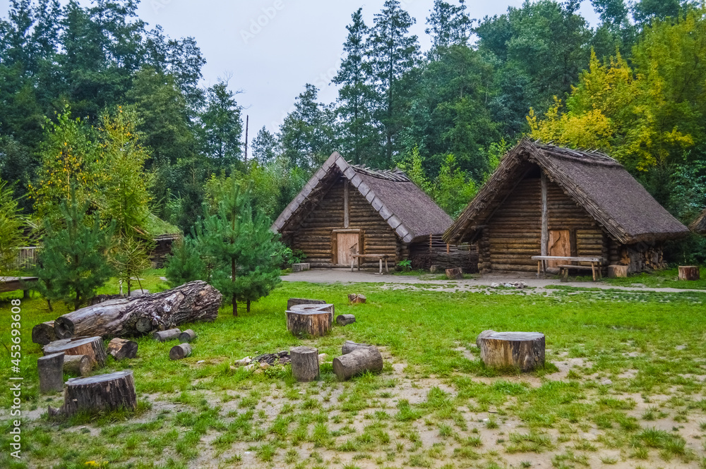 Very old wooden huts of the village of Biskupin, Poland Very old wooden huts of the village of Biskupin, Poland
