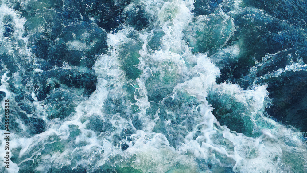 Fototapeta premium Picturesque top view to the turquoise sea waves strongly colliding with each other and creating beautiful foam and splashes in motion.