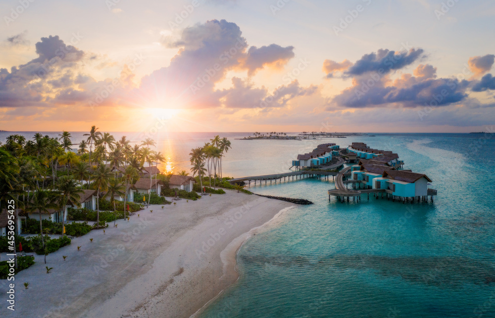 Amazing bird eyes view in Maldives island Eh'mafushi crossroads maldives at sunrise. Aerial drone shot Amazing bird eyes view in Maldives island Eh'mafushi crossroads maldives at sunrise. Aerial drone shot