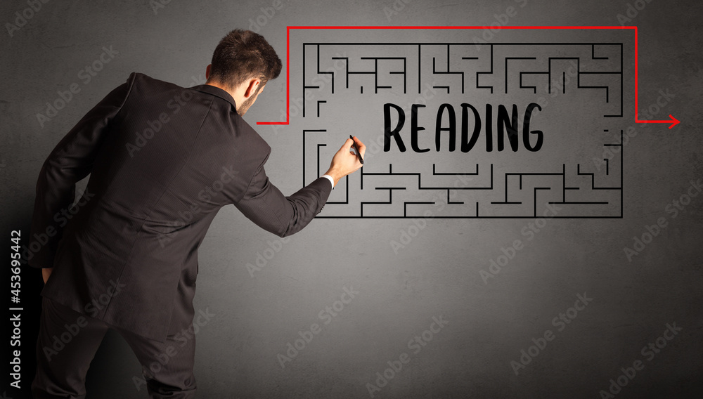 businessman drawing maze concept businessman drawing maze concept