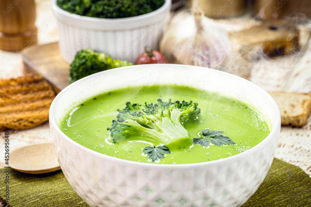 broccoli and green vegetable soup, creamy diet soup, served hot broccoli and green vegetable soup, creamy diet soup, served hot