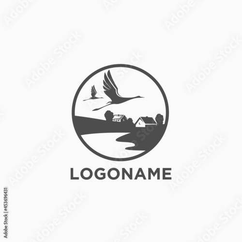 lake view with stork flying over it, lake logo, vilage logo