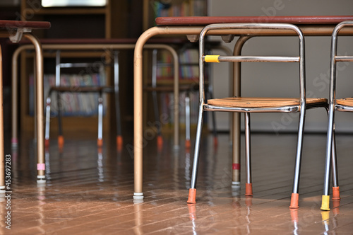 Chairs and tables in a kindergarten classroom. Daikanyama, Tokyo. photo