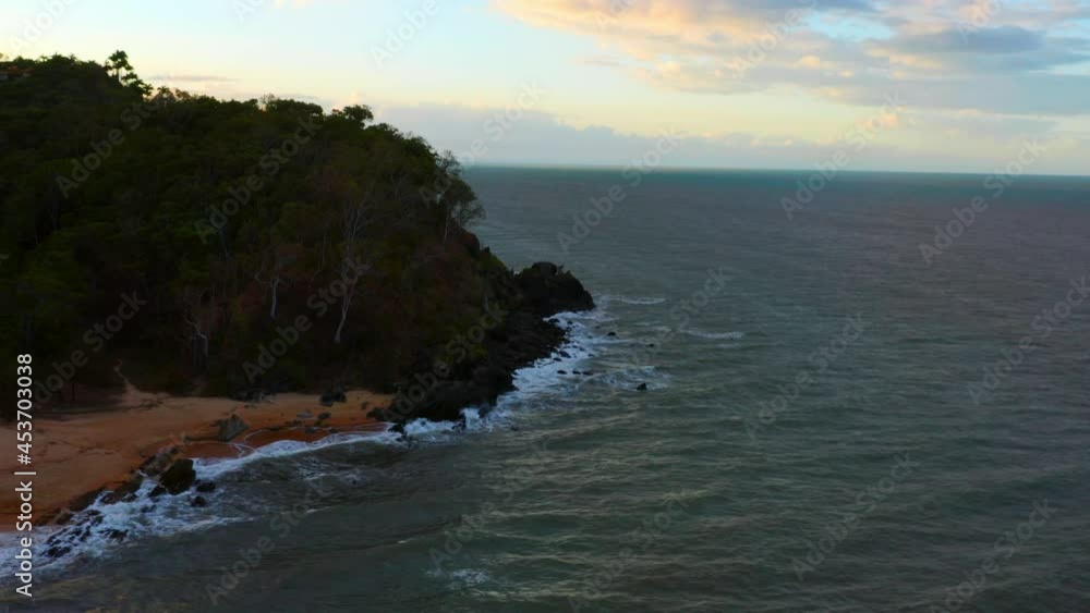 Aerial View Of Palm Cove In The Coastal Of Cairns In Queensland, Australia - drone shot Aerial View Of Palm Cove In The Coastal Of Cairns In Queensland, Australia - drone shot