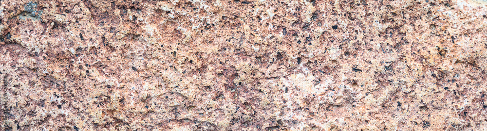 Closeup of rough textured rock as an abstract natural background
Closeup of rough textured rock as an abstract natural background