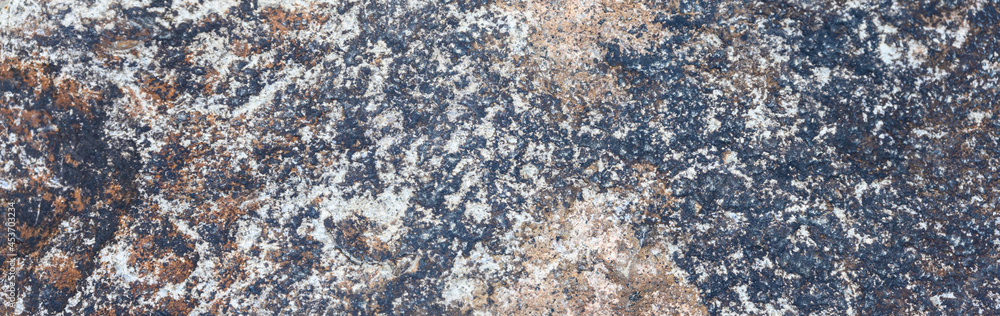 Closeup of rough textured rock as an abstract natural background
Closeup of rough textured rock as an abstract natural background