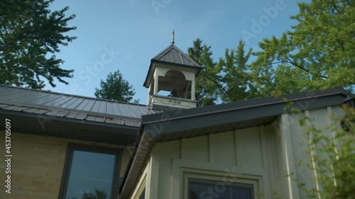 Wallpaper Mural Reveal bell tower on top of an old schoolhouse building. Establishing shot. Torontodigital.ca