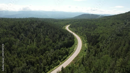 Winding road in the West Siberian taiga ecoregion