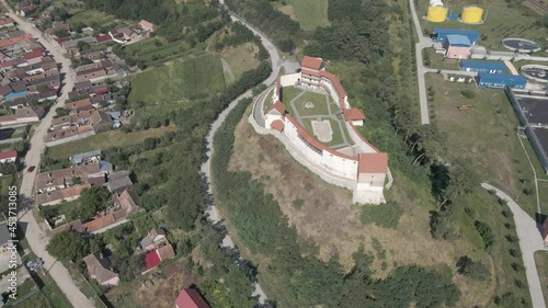 Feldioara Marienburg medieval fortress near Brasov, Romania, Hilltop fortified castle. photo