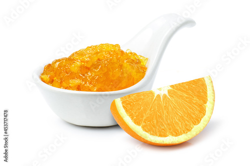 Fotografia orange marmalade on a spoon