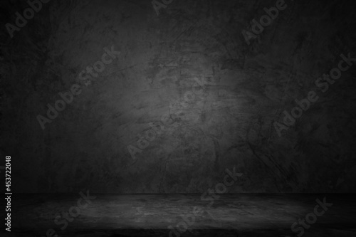Empty interior room and floor concrete with old brick wall dark for background. Texture of old dark concrete wall with scratches and cracks