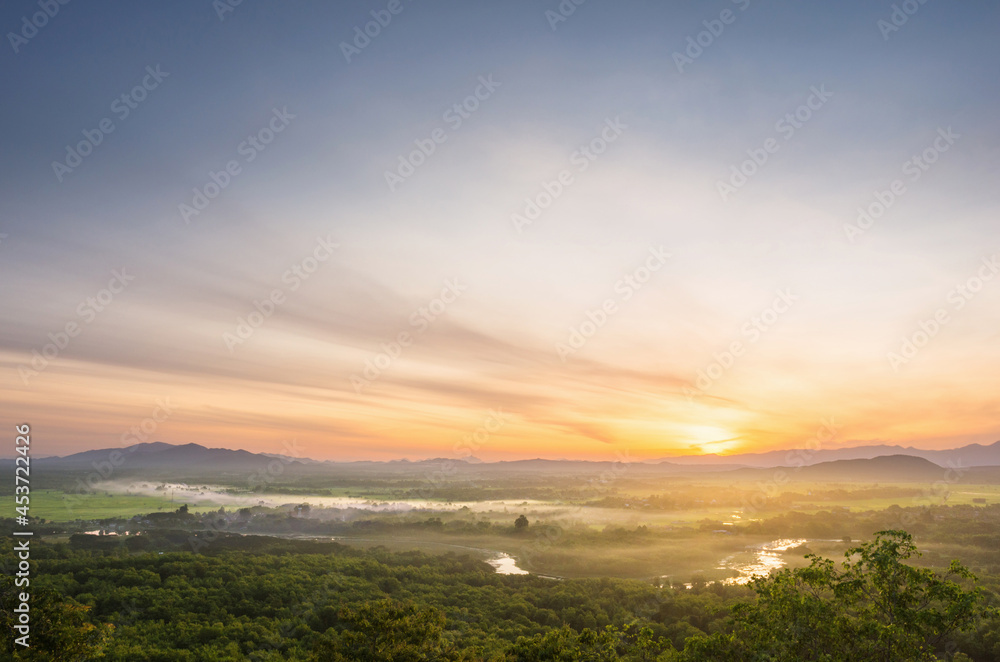 Fog in forest.Aerial view. Beautiful fog in the forest with green mountains and 
