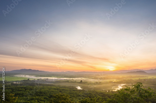 Fog in forest.Aerial view. Beautiful fog in the forest with green mountains and 