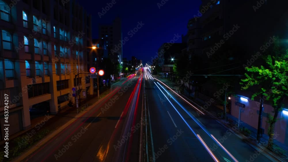 A night timelapse of the downtown street in Tokyo wide shot zoom A night timelapse of the downtown street in Tokyo wide shot zoom