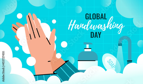 Global handwashing day. Person washes hands with a foam dispenser to prevent infection.