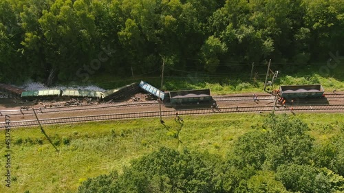 Arial view. Train accident. Rescue relief works in progress locomotive derailed photo