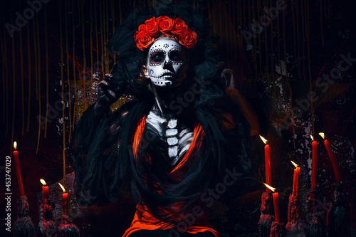 Santa Muerte. Portrait of a dead girl with candles