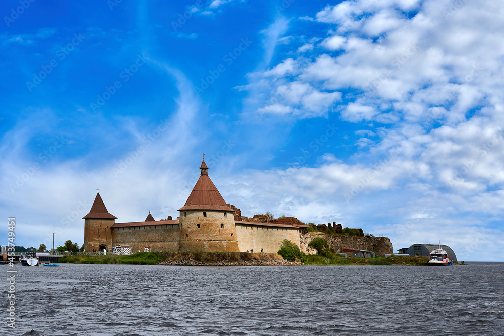 Natural landscape with a view of the old fortress by the lake