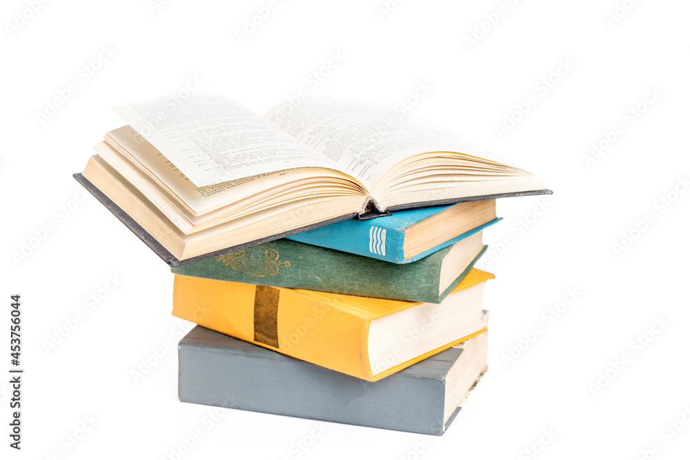 Stack of books isolated on white background. School, education, learning concept Stack of books isolated on white background. School, education, learning concept