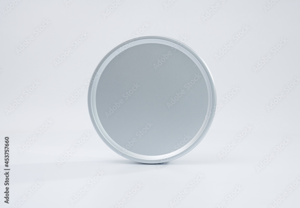 Front view of round metal box isolated on white background, high quality image. 3D rendering. Front view of round metal box isolated on white background, high quality image. 3D rendering.