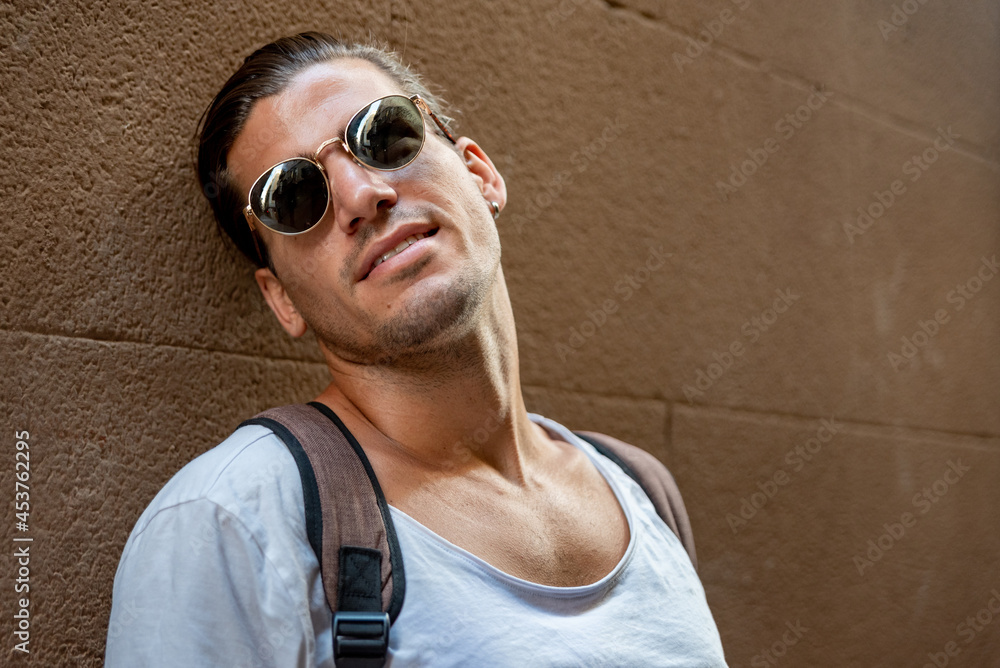 Portrait of young latin man with sun glasses Portrait of young latin man with sun glasses