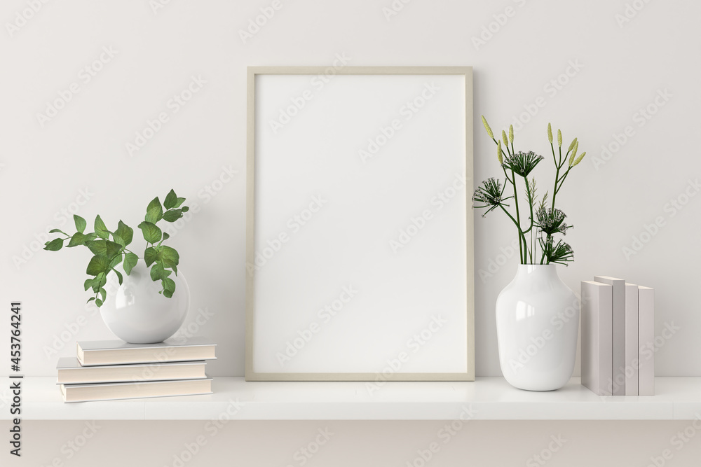 Fototapeta Makieta pustej ramki na półce z książkami i roślinami w porcelanowych wazonach.