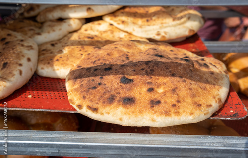 Fresh traditional iraqi bread sold at the city farmers market photo