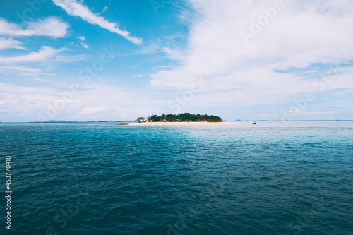 view of the sea and a remote island from a ferry boat