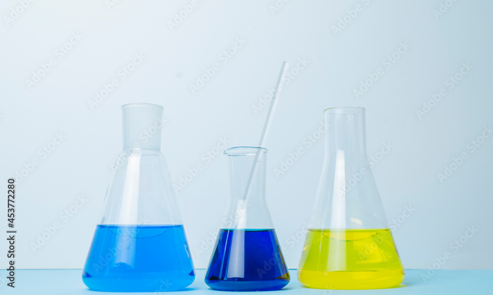 Reagents Beakers. Flasks with reagents. Biological laboratory. The concept is chemistry. Laboratory equipment, copy space Reagents Beakers. Flasks with reagents. Biological laboratory. The concept is chemistry. Laboratory equipment, copy space