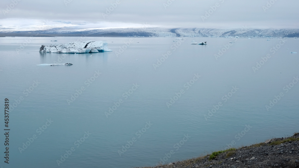 Jokulsarlon Glacier Lagoon in Iceland with icebergs and clear water
