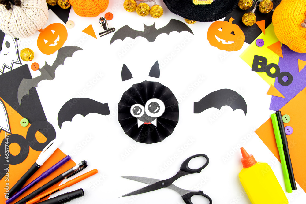 Instructions for making paper bat crafts with children. Step 7. Instructions for making paper bat crafts with children. Step 7.
