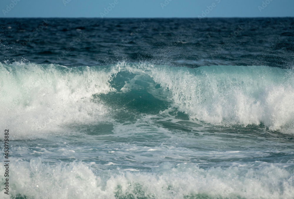 turquoise waves crashing at the beach turquoise waves crashing at the beach