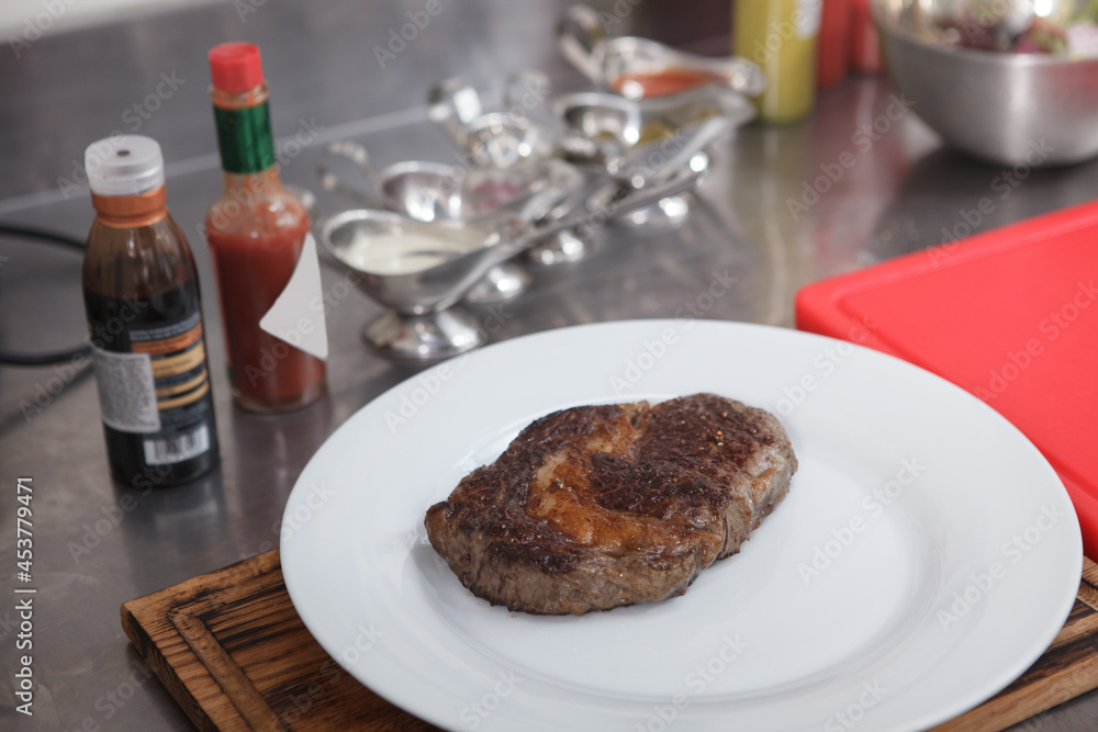 Close up of a delicious juicy beef steak on a plate Close up of a delicious juicy beef steak on a plate