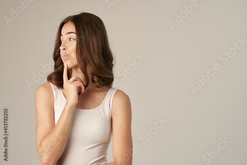 pretty woman in a white t-shirt hair care isolated background