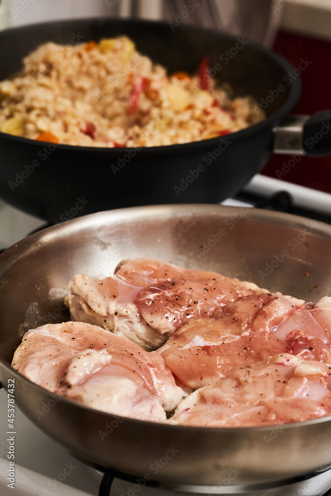 Seared chicken breasts in the pan Seared chicken breasts in the pan