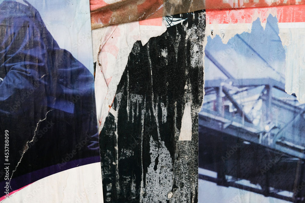 Fototapeta premium Torn poster background. Abstract retro texture. Vintage urban street design.