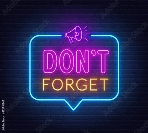 Don t Forget neon sign on brick wall background.
